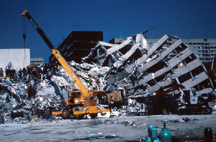 Figure 2: Fifteen-story reinforced concrete structure. Part of the building was only slightly damaged, while another part of it collapsed. Photo Mehmet Celebi, USGS